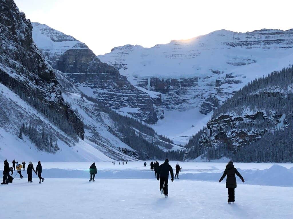 Ice skating on Lake Louise in winter