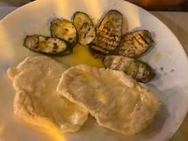 Chicken Picatta dinner with lemon sauce and grilled zuchinni