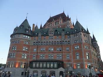 Chateau Frontenac a castle like building with red brick and turrets in Quebec City Canada