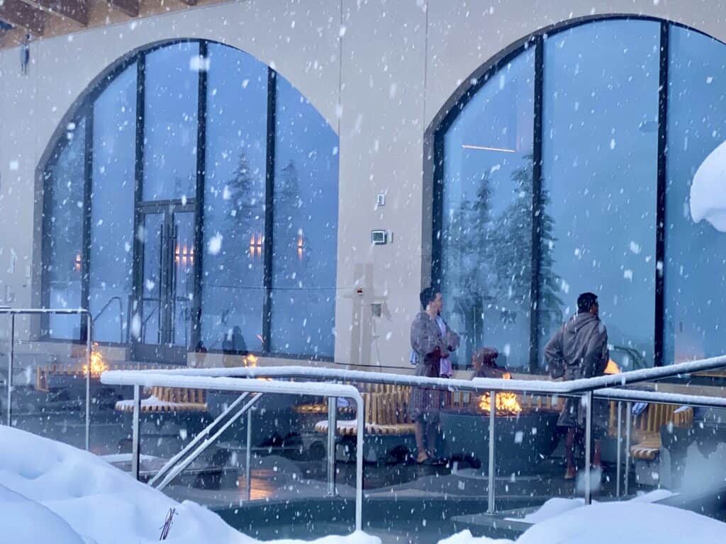 Basin Glacial Waters Pool Deck at Lake Louise with firepits and small hot pools